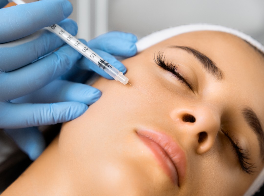 Close view of the eye area affected by dermal fillers